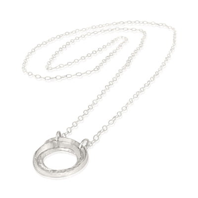 This sea swirl necklace is pictured in eco-silver and available in three lengths.