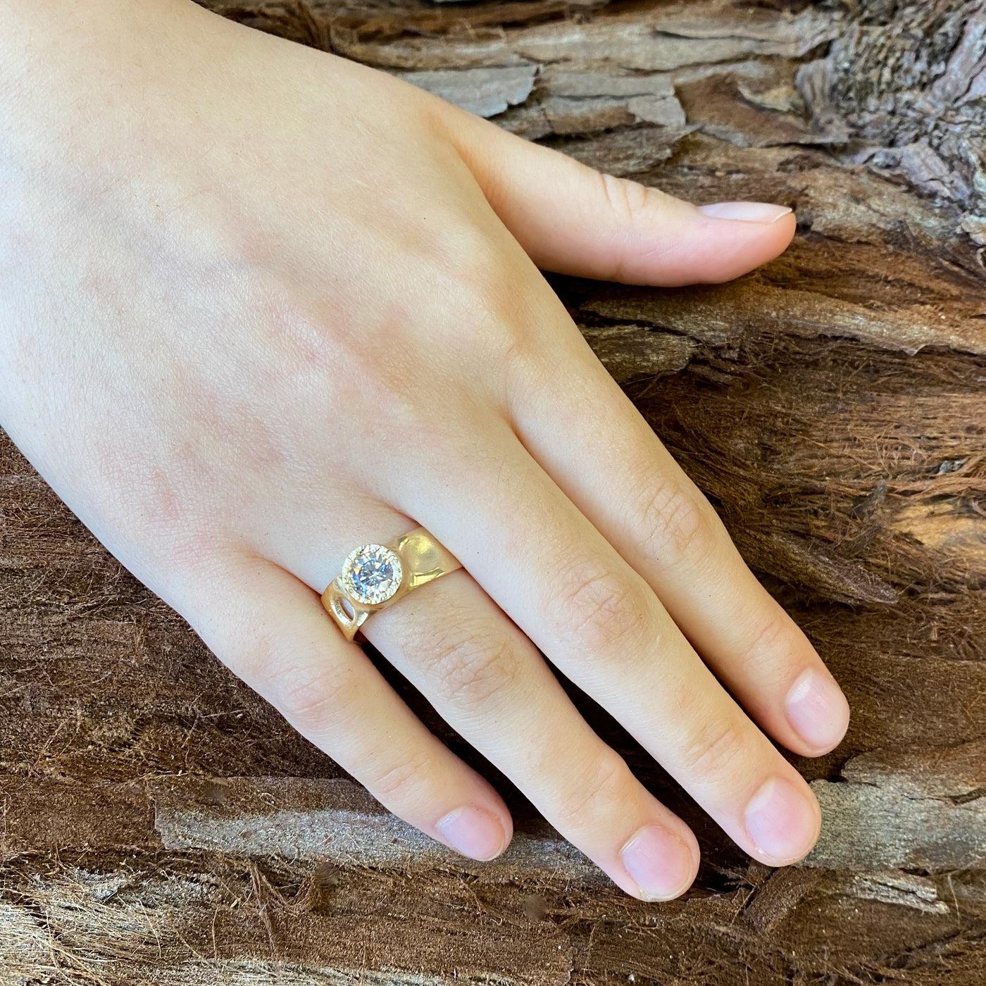 Tidepools sustainable wedding and engagement ring bands inspired by ocean waves and tide pools made in certified recycled gold by WEND Jewelry. #gemstone-size_6mm